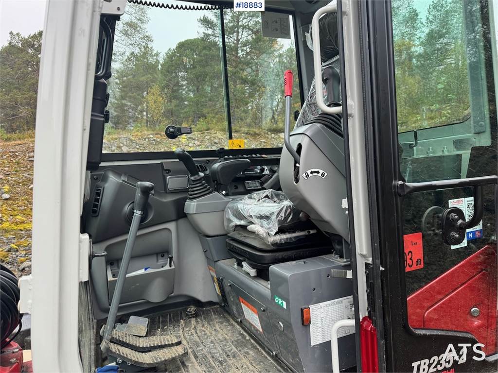 Takeuchi TB235-2 Mini excavator w/ Rototilt and 3 buckets.