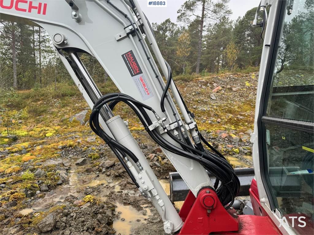 Takeuchi TB235-2 Mini excavator w/ Rototilt and 3 buckets.