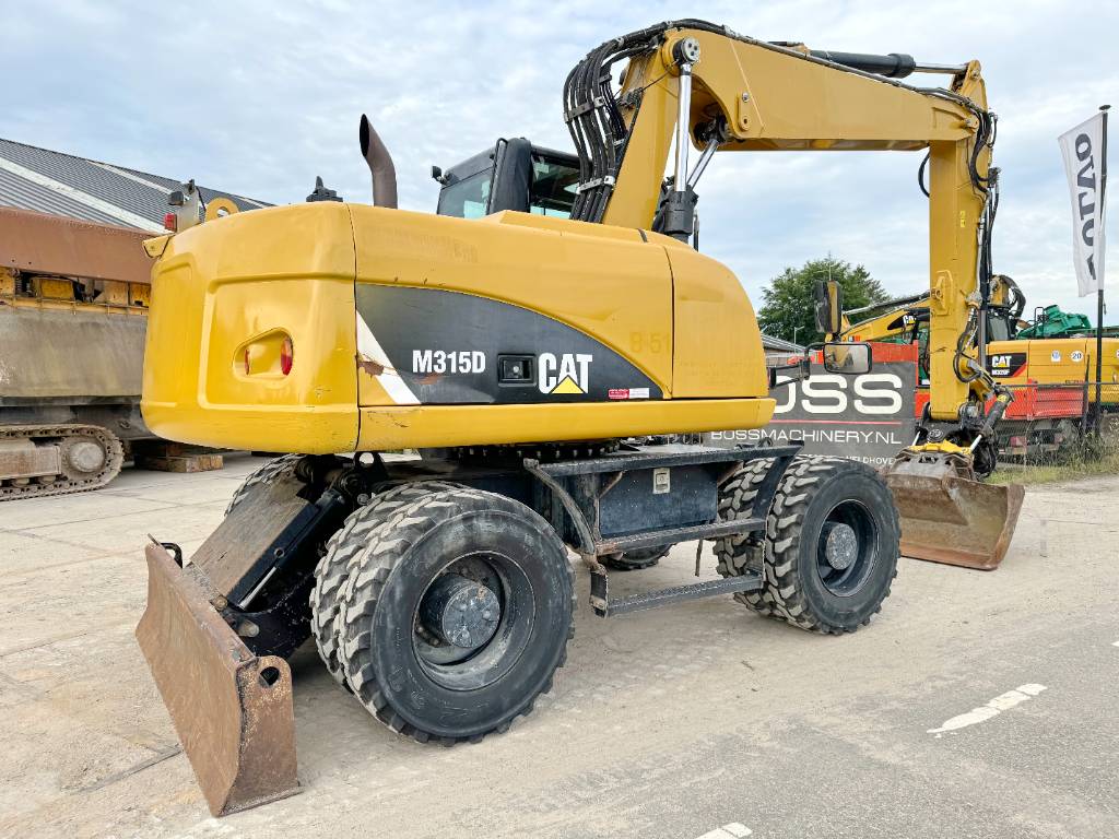 CAT M315D - 360° Engcon Rotating Bucket + Grapple