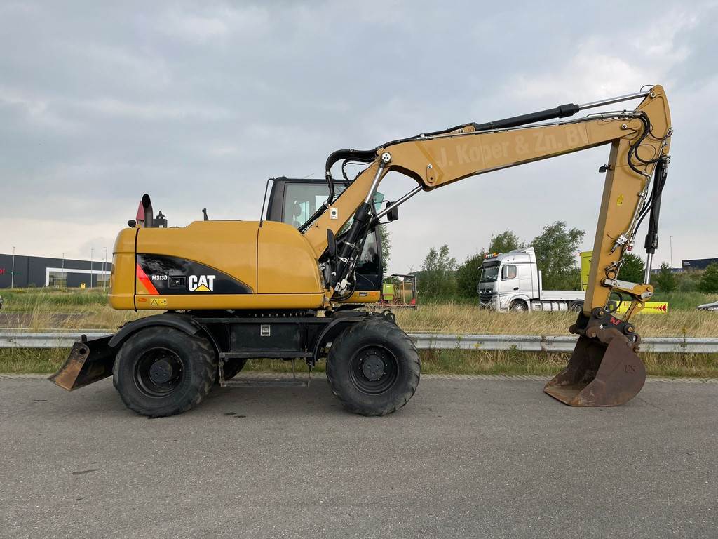 CAT M313D