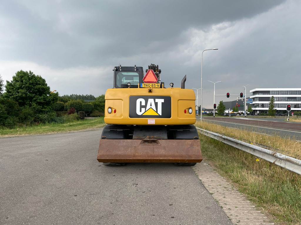 CAT M313D