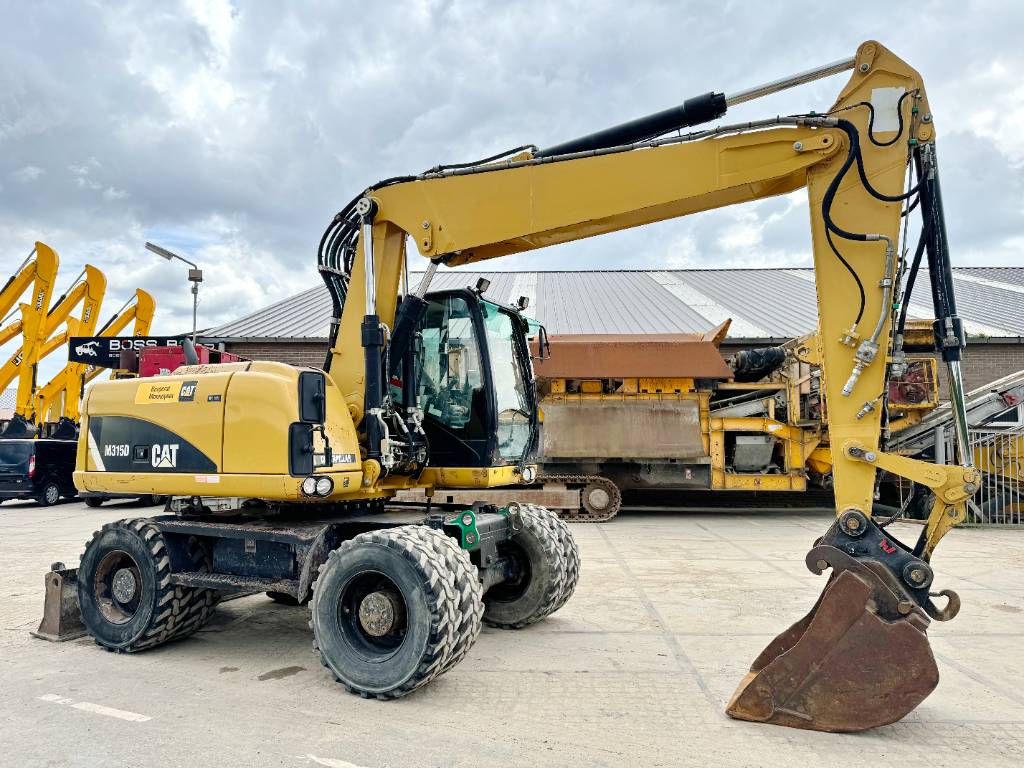 CAT M315D - Triple Boom / Quick Coupler