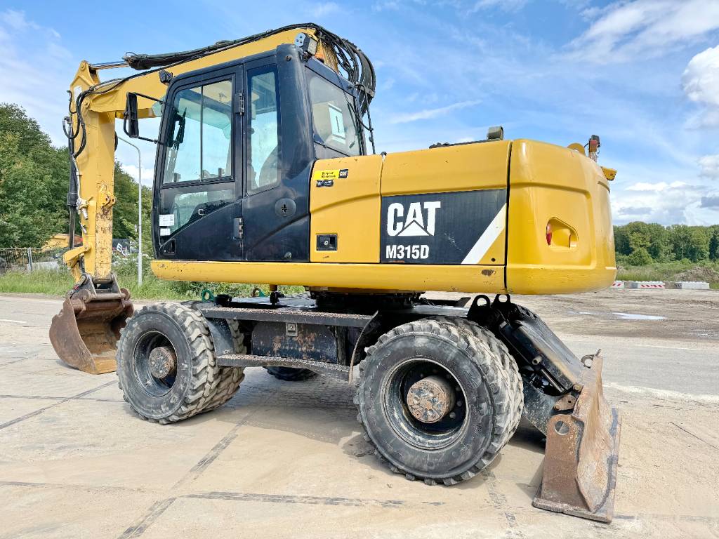 CAT M315D - Triple Boom / Quick Coupler