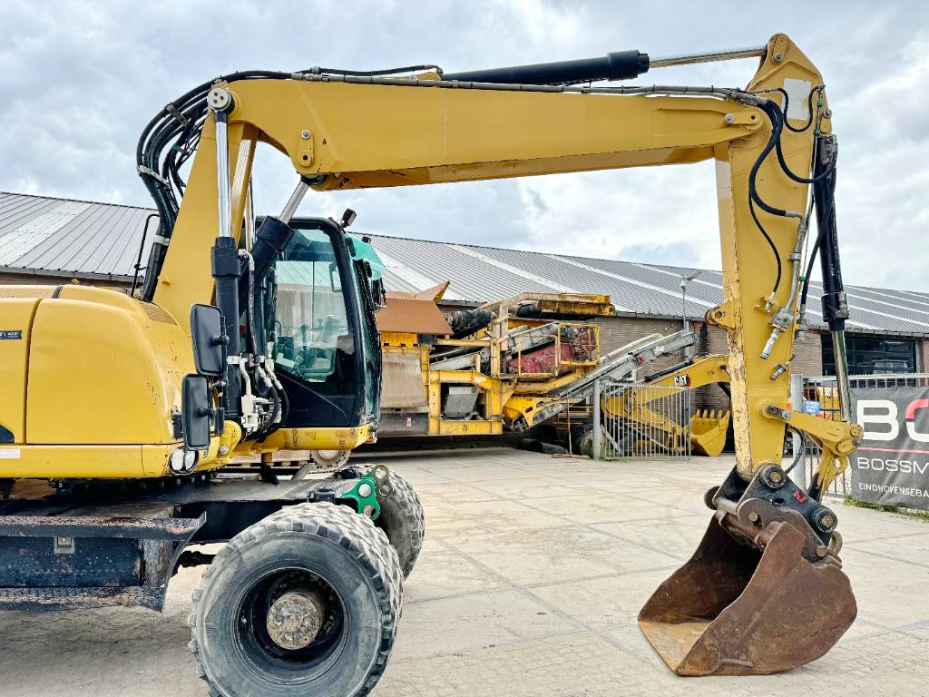 CAT M315D - Triple Boom / Quick Coupler