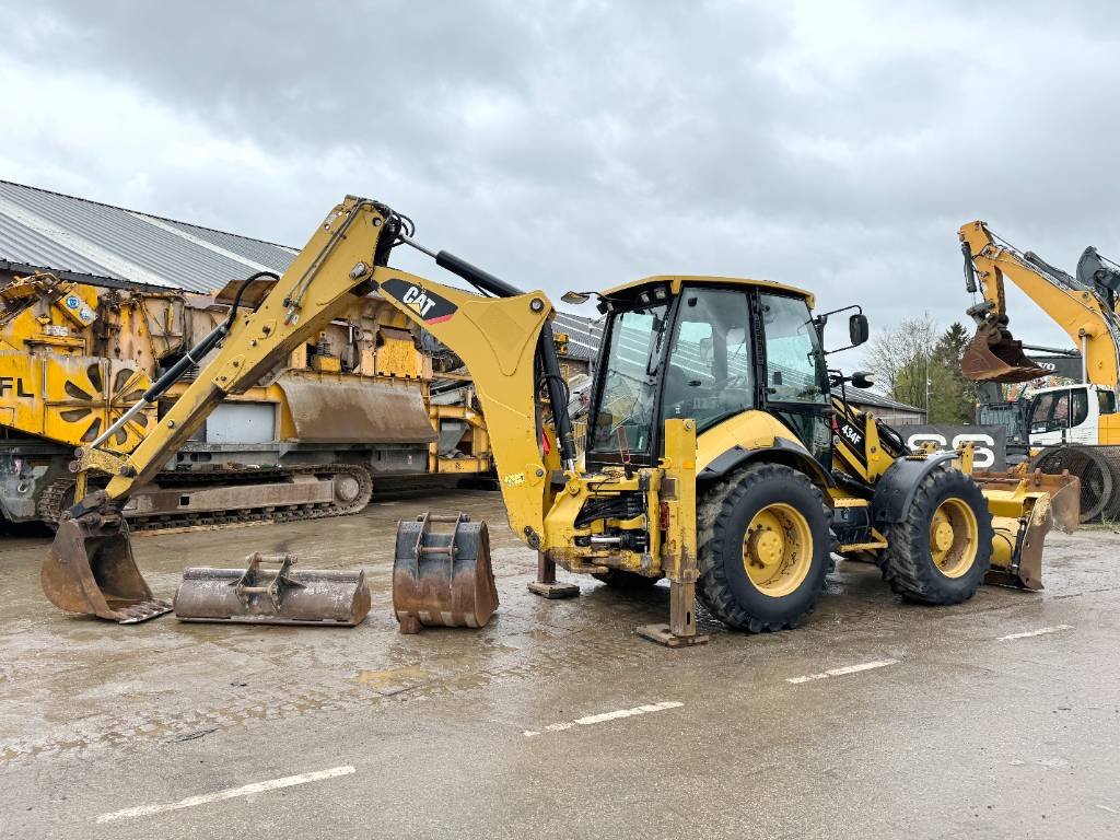 CAT 434F - 4 Buckets + Forks / All Wheel Steering