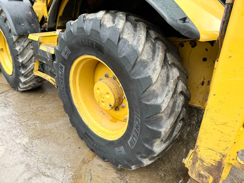 CAT 434F - 4 Buckets + Forks / All Wheel Steering