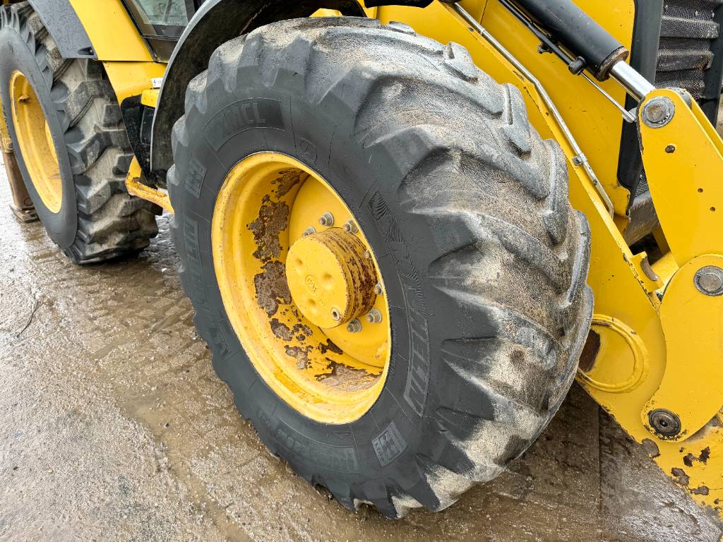 CAT 434F - 4 Buckets + Forks / All Wheel Steering