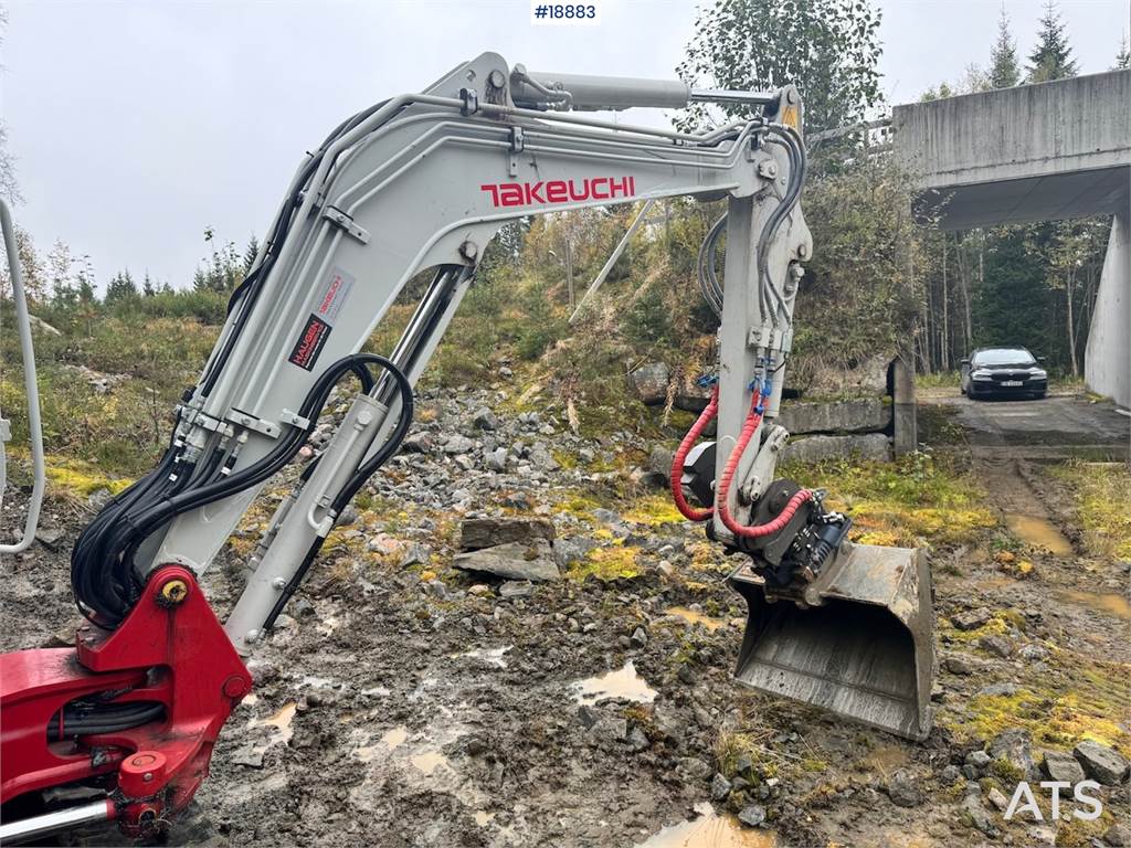 Takeuchi TB235-2 Mini excavator w/ Rototilt and 3 buckets.