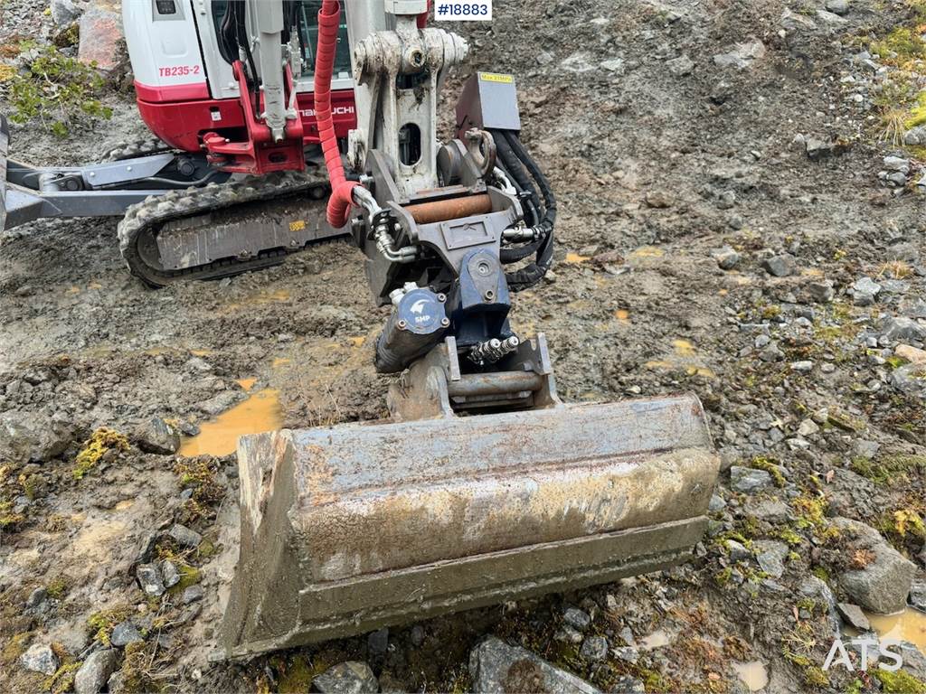 Takeuchi TB235-2 Mini excavator w/ Rototilt and 3 buckets.