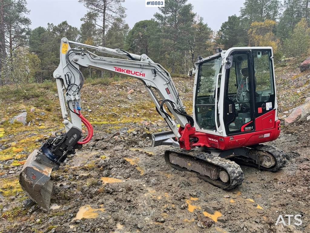 Takeuchi TB235-2 Mini excavator w/ Rototilt and 3 buckets.