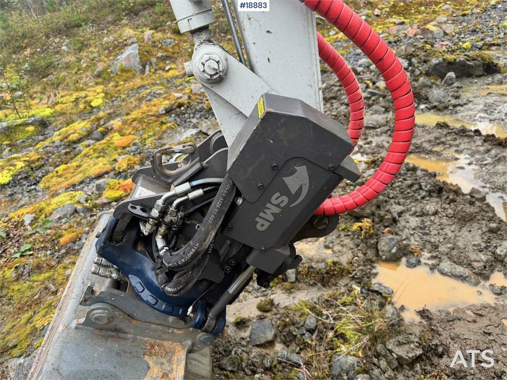 Takeuchi TB235-2 Mini excavator w/ Rototilt and 3 buckets.