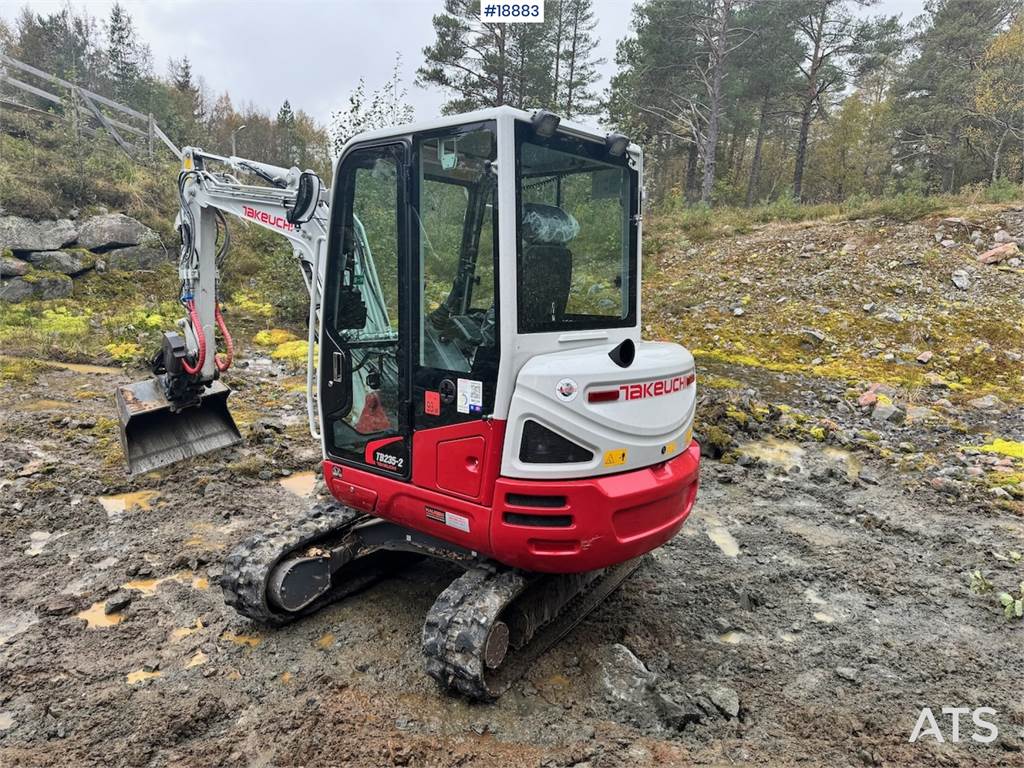 Takeuchi TB235-2 Mini excavator w/ Rototilt and 3 buckets.