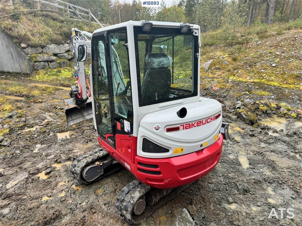 Takeuchi TB235-2 Mini excavator w/ Rototilt and 3 buckets.