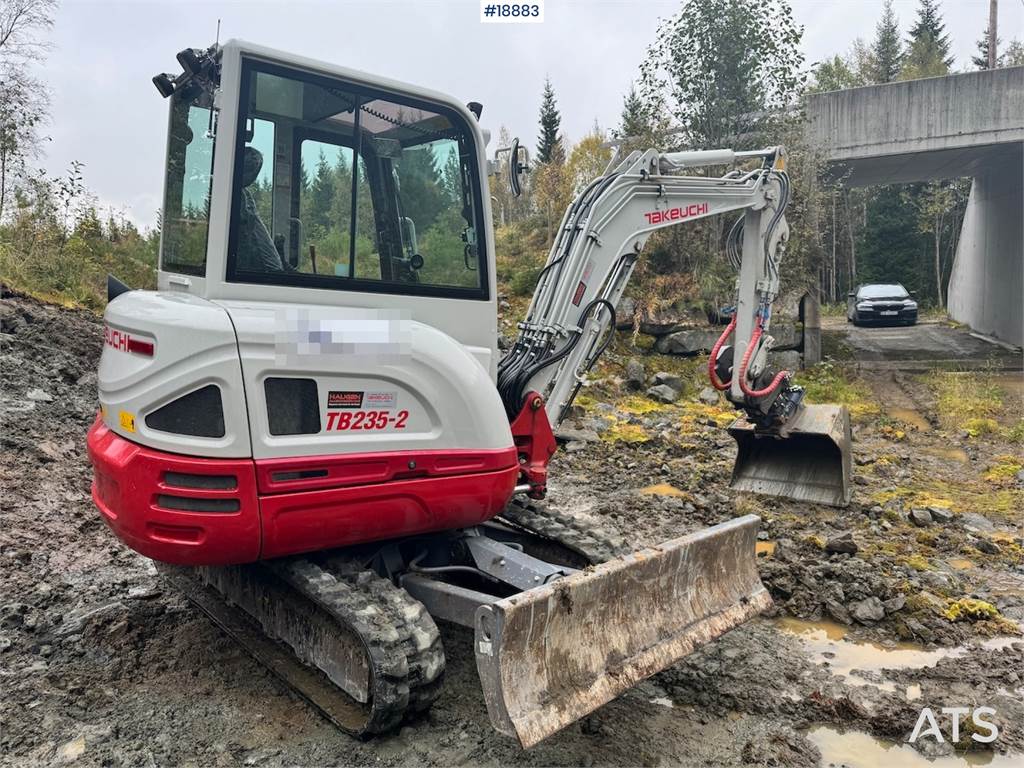 Takeuchi TB235-2 Mini excavator w/ Rototilt and 3 buckets.