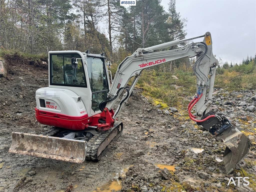 Takeuchi TB235-2 Mini excavator w/ Rototilt and 3 buckets.