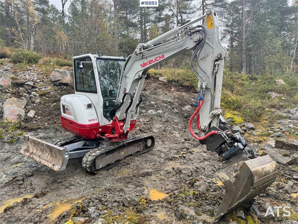 Takeuchi TB235-2 Mini excavator w/ Rototilt and 3 buckets.