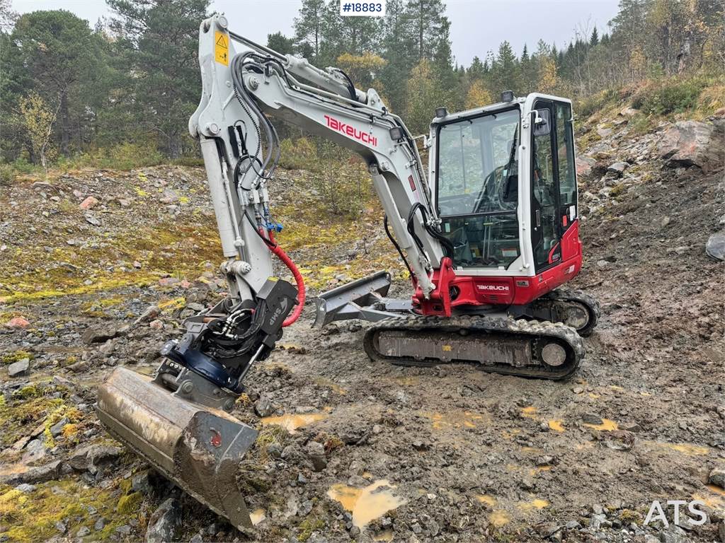 Takeuchi TB235-2 Mini excavator w/ Rototilt and 3 buckets.