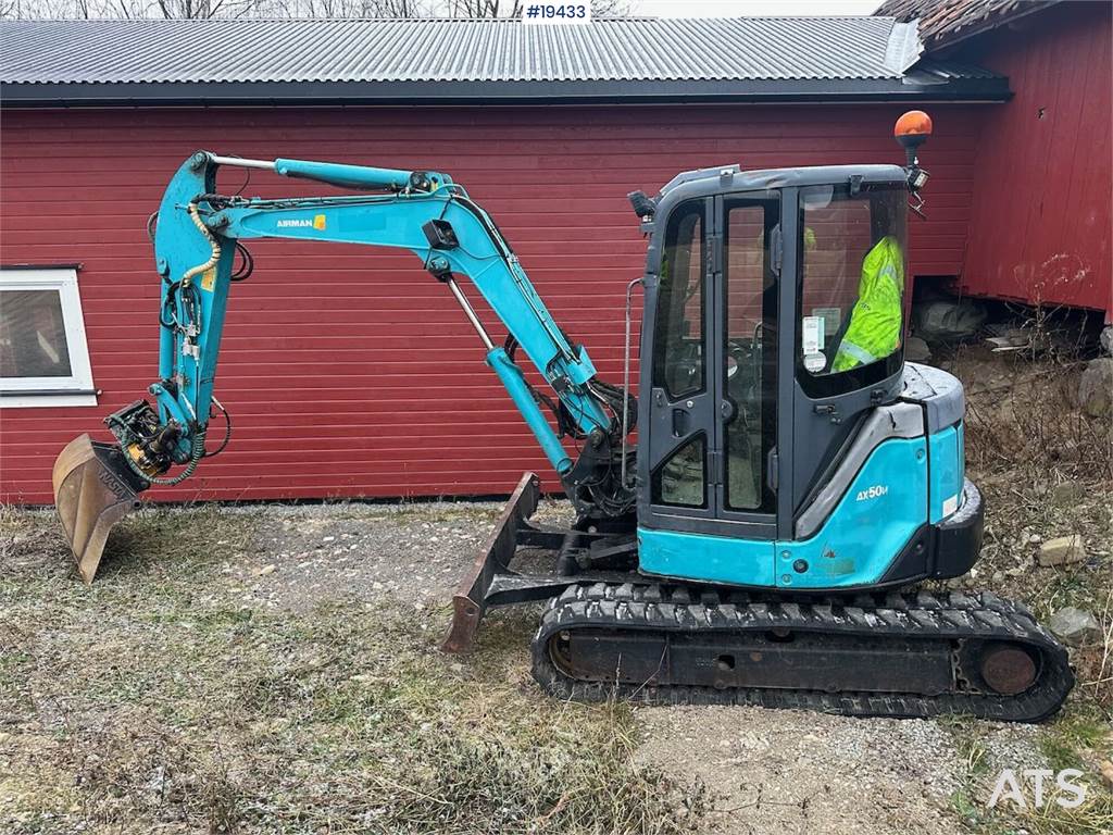 Airman AX50U-4 w/ 3 buckets, ripper, pinch, rototilt and